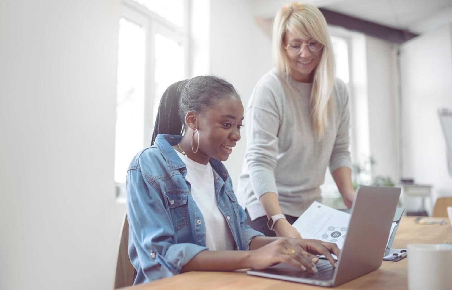 Budget planning workshop with participants reviewing financial documents