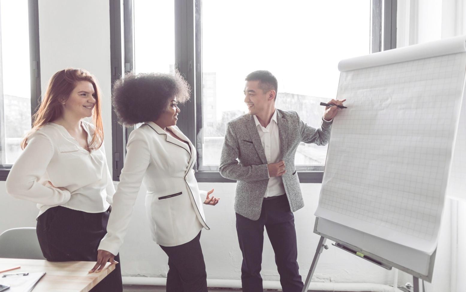 Digital budgeting workspace with laptop and financial documents